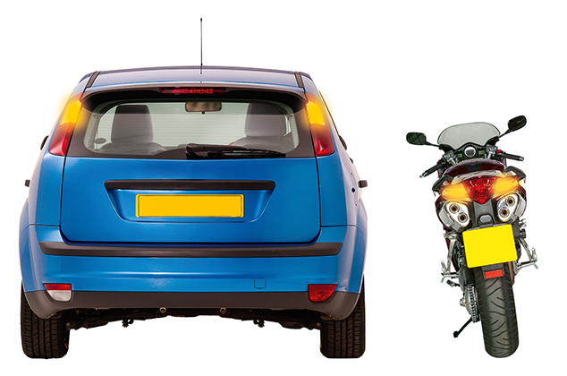 I am temporarily obstructing traffic or warning of a hazard or obstruction ahead (see Rule 116)